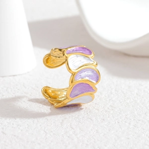 Adjustable golden stainless steel ring with purple and white enamel petals in a sleek design