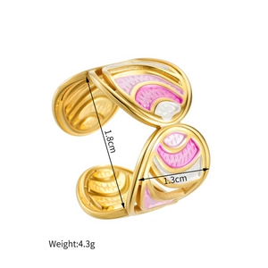 Detail of pink and white enamel pattern on a golden open ring with size dimensions