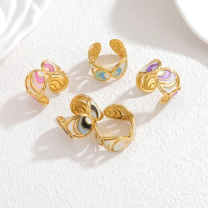Five-piece adjustable gold-plated ring set with colorful enamel butterflies and wave designs