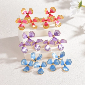 Elegant 18k gold floral earrings set featuring pink, blue and purple enamel flower petals