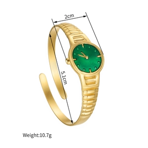 Vue détaillée du bracelet montre doré avec cadran vert montrant dimensions et poids