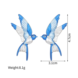 Blue enamel flying bird stud earrings showing dimensions 4.7cm x 3.1cm and weight 8.1g