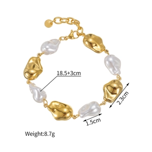 Detailed view of baroque pearl and gold metal links with measurement specs on white background