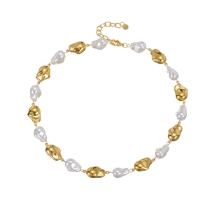 Elegant baroque pearl and gold bead necklace with adjustable lobster clasp on white background