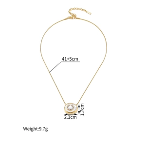 Detail view of oval gold necklace with dimensions 1.7x2.1cm and 41+5cm adjustable chain