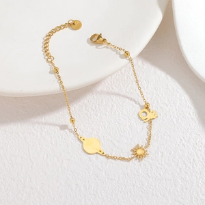 Bracciale da donna in acciaio inossidabile placcato oro 18K con ciondoli sole e Saturno