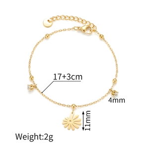 Detailed view of 18k gold lotus bracelet showing 17+3cm length and 2g weight specs