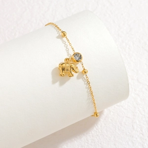 18k gold stainless steel bracelet featuring a 3D elephant charm and clear crystal stone