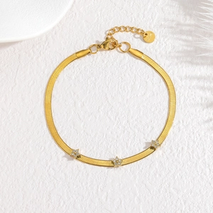 Bracelet chaîne serpent en acier plaqué or 18 carats avec breloques étoiles scintillantes