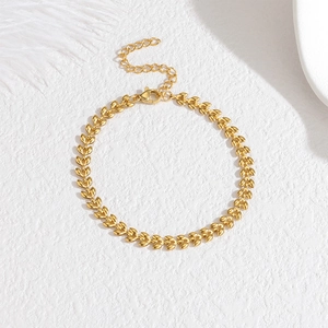 Elegant gold wheat ear link chain bracelet with adjustable lobster clasp on white stone