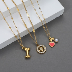 Collier À Pendentif En Acier Inoxydable Plqué Or Coeur Os Étoile Zircon Künstliche Perle Charme Bijoux Pour Femmes Élégant Mode