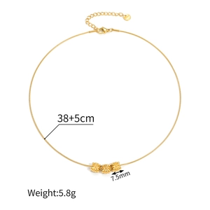 Technical dimensions of gold beaded sweater necklace with floral charms weighing 5.8g