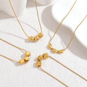 18k gold plated geometric necklaces with heart and sunflower pendants on snake chains