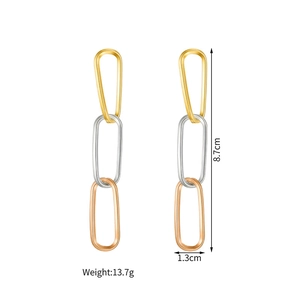 Detailed view of tricolor interlocking geometric hoop earrings showing size 8.7cm length