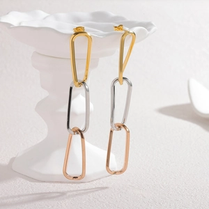 Three-tone stainless steel geometric chain drop earrings in gold, silver, and rose gold