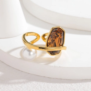 18K gold geometric steel ring with amber rectangle crystal and pearl in main view