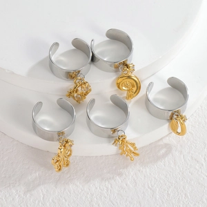 5-piece ocean theme ring set with gold octopus and shell charms on silver bands