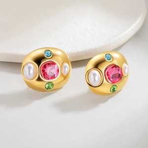Boucles d'oreilles vintage en or avec gemmes roses, perles et zircons sur base céramique