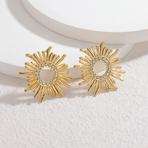 Golden sunflower stud earrings with cubic zirconia inlay and radial sunburst design
