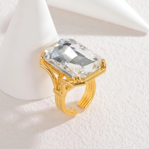 18k gold plated stainless steel ring with large rectangular zircon on geometric stand