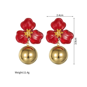 Detail view of 18k gold plated flower earrings showing dimensions 2.4cm by 3.9cm