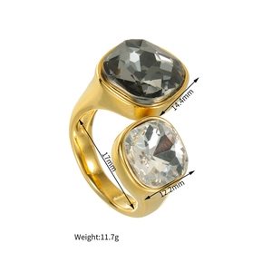 Detail view of gold ring with two large square zircons and size specifications