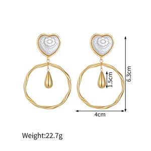 Detailed view of 18k gold heart earrings with size markers 6.3cm height and 4cm width