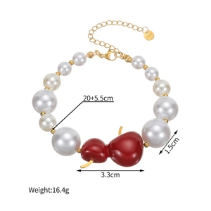 Détail du bracelet en perles avec pendentif gourde rouge, logo S.Steel et dimensions