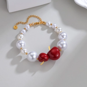 Bracelet de perles en acier inoxydable doré 18 carats avec breloques pomme rouge