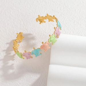 Bracelets tortue de mer dorés 18 carats avec incrustation d'émail marbré de couleurs variées