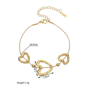 Detailed view of 18k gold plated hollow heart charm bracelet with dimensions and weight info