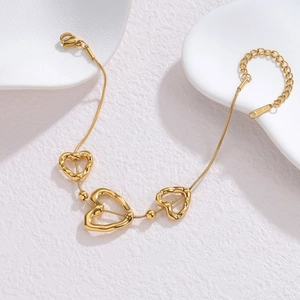 Gold 18k plated stainless steel snake chain bracelet with hollow heart pendants