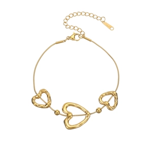 18k gold plated stainless steel bracelet with three hollow heart charms on snake chain