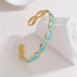 Bracelet jonc coquillage plaqué or 18k avec émail bleu vibrant pour femme chic et mode