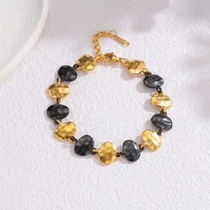 Minimalist hammered oval chain bracelet in gold and gun black contrast finish