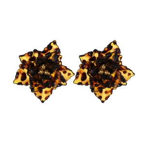 Vintage leopard print flower stud earrings with golden bead centers on white background