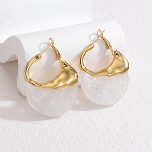 French vintage geometric gold and cream earrings with textured resin on stone