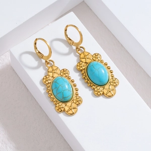 Boucles d'oreilles vintage en acier doré 18k avec turquoise ovale et motif d'étoile