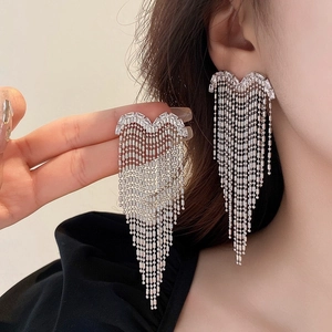 Elegant heart-shaped tassel earrings with dangling silver bead chains and zircon stones