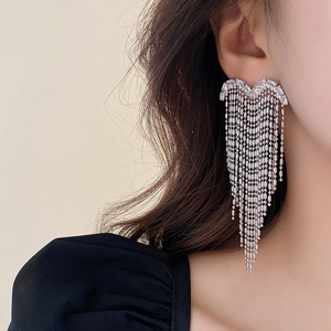 Silver fringe tassel earrings with shimmering crystals for elegant evening wear