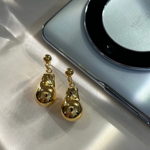Elegant gold teardrop earrings with a polished finish in a minimalist geometric design