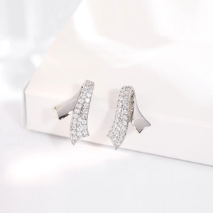 Elegant 24k gold-plated silver ribbon stud earrings with shimmering pave zircon stones