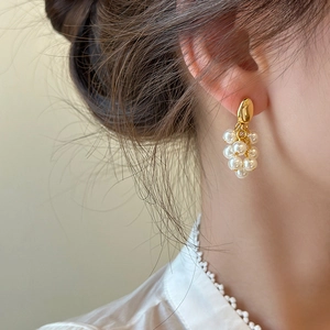 Elegant gold pearl grape cluster drop earrings for women with white lace collar detail