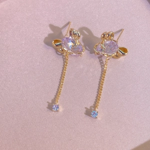 Boucles d'oreilles nœud plaquées or 24K avec pierres lavande et longs pompons