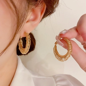 Exquisite gold woven textured hoop earrings in 925 silver for an elegant feminine look