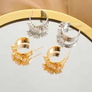 Sparkling star zircon C-shaped hoop earrings with gold and silver triple line design
