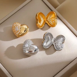 Elegant heart-shaped earring charms with zircon inlay in gold and silver plating