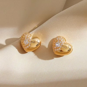 Elegant gold heart-shaped hoop earrings featuring pave-set colorful zircons and crystals