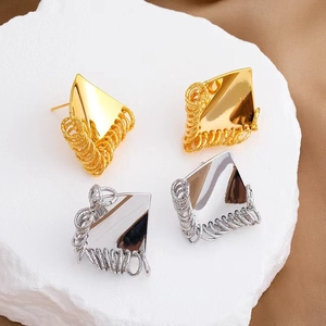 Modern geometric triangle stud earrings in gold and silver finish with wire texture