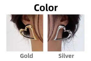 Comparison of large minimalist hollow heart earrings in polished gold and silver finishes